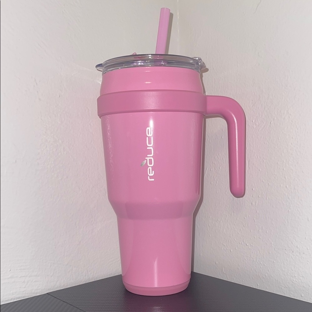 Reduce Pink Tumbler with Handle